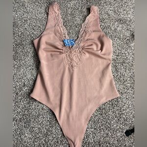 Intimately by FREE PEOPLE  pink/nude ribbed laced thong bodysuit size medium new